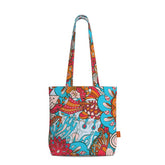 Colorful cotton tote bag with vibrant Inia print featuring an artistic mix of turquoise, orange, and coral hues. Retro Chic Abstract Psychedelic Floral - London Bliss by Blissfully Brand Made in England
