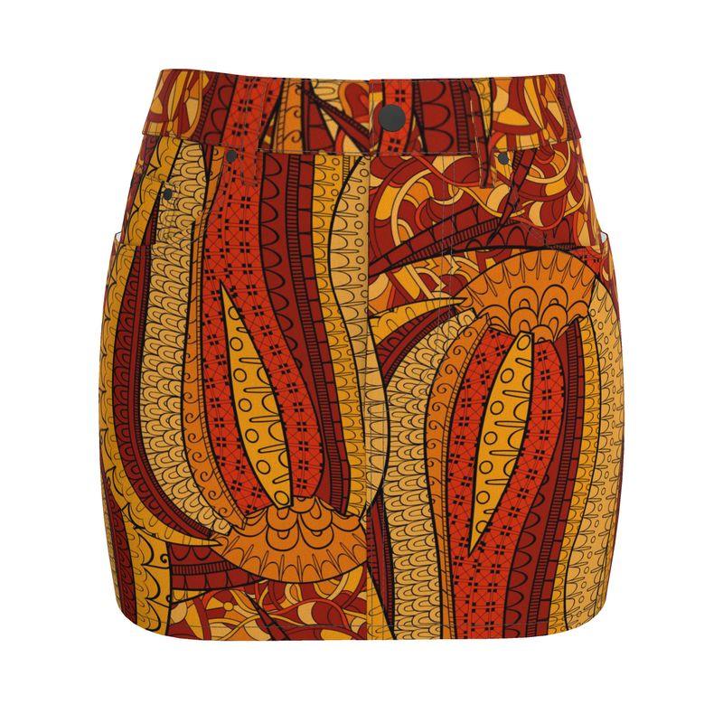 Tribal-inspired Ame print mini denim skirt in orange, red and yellow patterns with comfortable stretch fabric and back pockets - Blissfully Brand