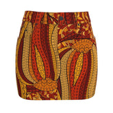Tribal-inspired Ame print mini denim skirt in orange, red and yellow patterns with comfortable stretch fabric and back pockets - Blissfully Brand