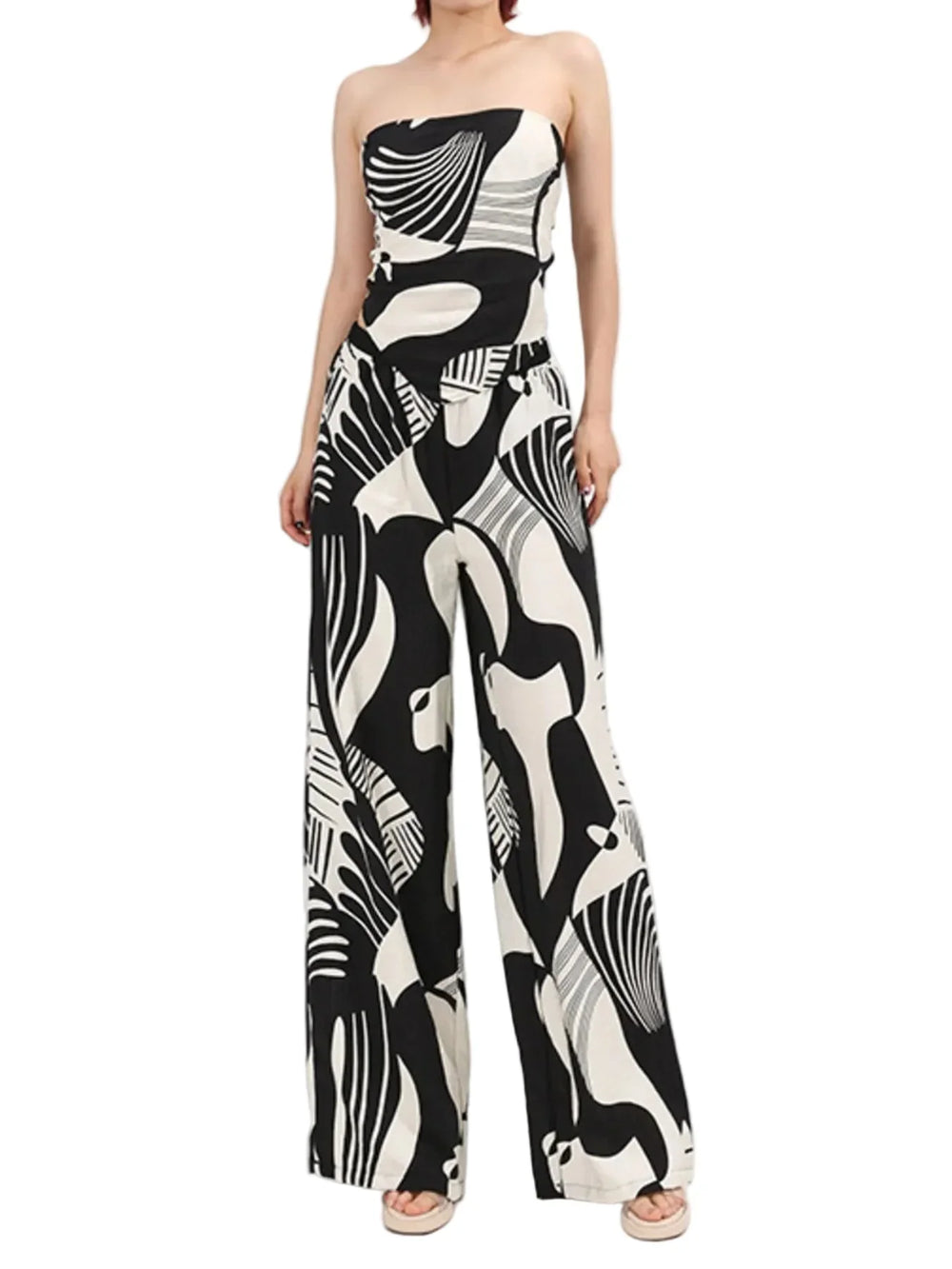 chic black and white abstract print two-piece ensemble featuring a strapless bandeau top and high-waisted wide-leg palazzo pants - Blissfully Brand Jeans