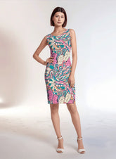 Arane knee length dress by Blissfully Brand featuring bold, colorful floral paisley patterns for a vibrant, statement-making style. Retro Chic & Vintage vibe