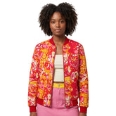 Decora Bold Retro Print Flexe Denim Bomber Jacket — red, pink and gold abstract print with Torch Red ribbed collar and cuffs, styled with matching Flexe Denim midi skirt