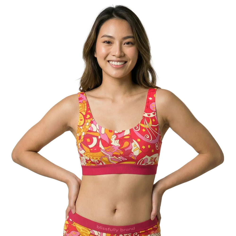 Blissfully Brand Decora Print Scoop Bralette in vibrant Torch Red, Sunglow Orange, Tickle Me Pink and Papaya Whip psychedelic swirl print — deep scoop back pullover bralette with crimson elastic underband, handmade in Montreal Canada,