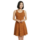 sleeveless A-line scoop neck skater dress with a geometric pattern in shades of brown, orange, and green. Handmade Blissfully Brand