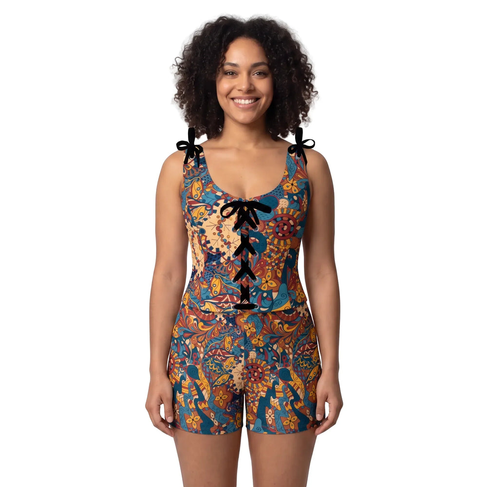Kuri print shaping sleepwear set with adjustable tie-shoulder top and shorts, corset lace detail, bold teal and gold psychedelic pattern