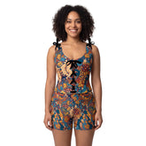 Kuri print shaping sleepwear set with adjustable tie-shoulder top and shorts, corset lace detail, bold teal and gold psychedelic pattern
