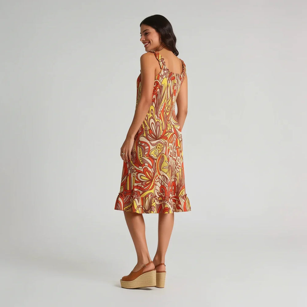 Back view of Miarna print dress showing ruffled neckline, spaghetti straps, and ruffle hem with retro floral print - Blissfully Brand relaxed fit dress