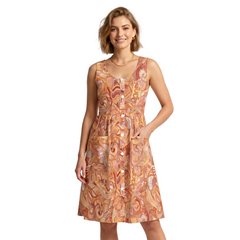 Mikani Print Babydoll Dress in warm terracotta and amber psychedelic swirl print — sleeveless A-line silhouette with decorative buttons, front pockets, and gathered waist — made to order women's fashion at BlissfullyBrand.com
