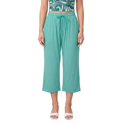 Woman wearing Puerto Rico Green wide-leg capri pants with Persian Green drawstring tie and Mima print tube top - Blissfully Brand Solid Series