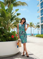 Bold and vibrant retro chic Nela dress by Blissfully Brand featuring a colorful abstract paisley-inspired pattern with swirls, florals, and geometric accents, designed for confident women who embrace statement-making fashion with a sleek, fitted silhouette.