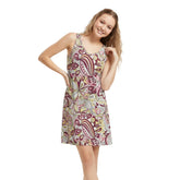 Piki Sleeveless mini dress with bold burgundy, pink and yellow abstract retro floral print pattern on white background, fitted silhouette - Blissfully Brand