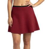 Renai Quilted mini skater skirt in Pohukutawa Red, featuring diamond-quilted texture and flared A-line design - Blissfully Brand