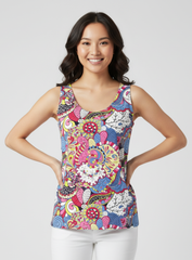Sechia print round neck tank top featuring vibrant psychedelic florals in hot pink, cobalt blue, chartreuse and crimson, paired with white jeans — Profonde Collection by Blissfully Brand, made to order in Montreal