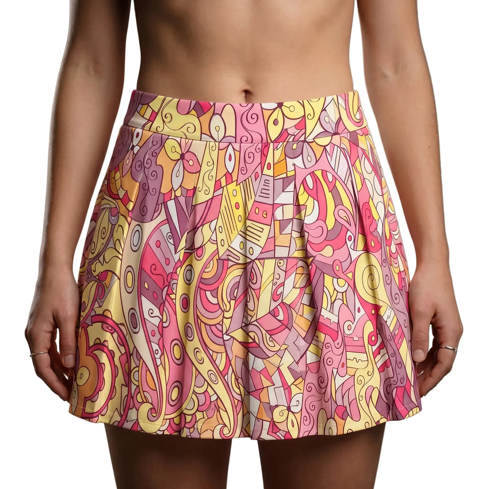 Vibrant Semia print mini pleated skirt in pink, yellow, and orange abstract patterns, featuring soft pleats for a playful, comfortable fit.