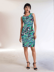 Bold and vibrant retro chic Nela dress by Blissfully Brand featuring a colorful abstract paisley-inspired pattern with swirls, florals, and geometric accents, designed for confident women who embrace statement-making fashion with a sleek, fitted silhouette.