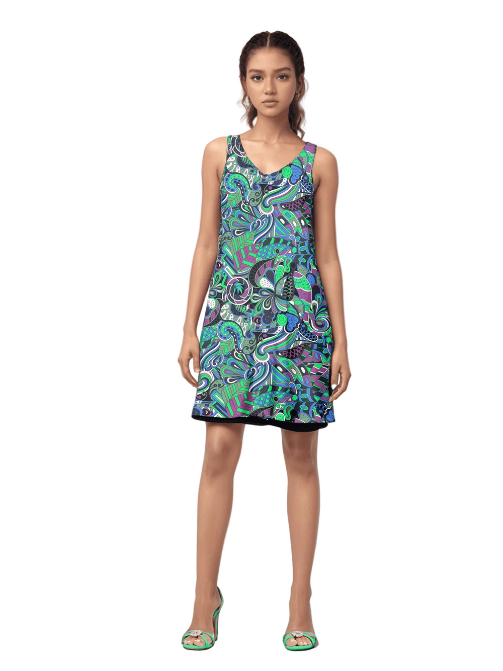 Vibrant Nela reversible dress by Blissfully Brand featuring bold, retro-inspired psychedelic patterns in green, purple, and black tones, designed in a chic, sleeveless A-line style perfect for making a statement look