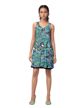 Vibrant Nela reversible dress by Blissfully Brand featuring bold, retro-inspired psychedelic patterns in green, purple, and black tones, designed in a chic, sleeveless A-line style perfect for making a statement look