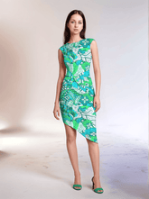 Umibe dress by Blissfully Brand featuring a bold, vibrant retro-chic pattern with swirling greens, blues, and floral motifs, designed in a sleeveless, asymmetrical hemline silhouette. Perfect for confident statement-makers who embrace unique, eye-catching fashion