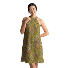 Wanda vibrant green and yellow paisley print halter dress with a flowy silhouette. The dress features a halter neckline and a relaxed, comfortable fit.