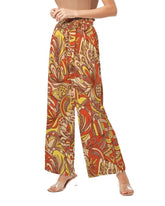 wide-legged pants with a vibrant orange, yellow, and brown floral print and belt tie retro Blissfully Brand