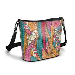 Taki print handmade Nappa leather bucket bag in teal, fuchsia, amber gold, and crimson psychedelic paisley print, gunmetal hardware, black adjustable crossbody strap — London Bliss Collection by Blissfully Brand