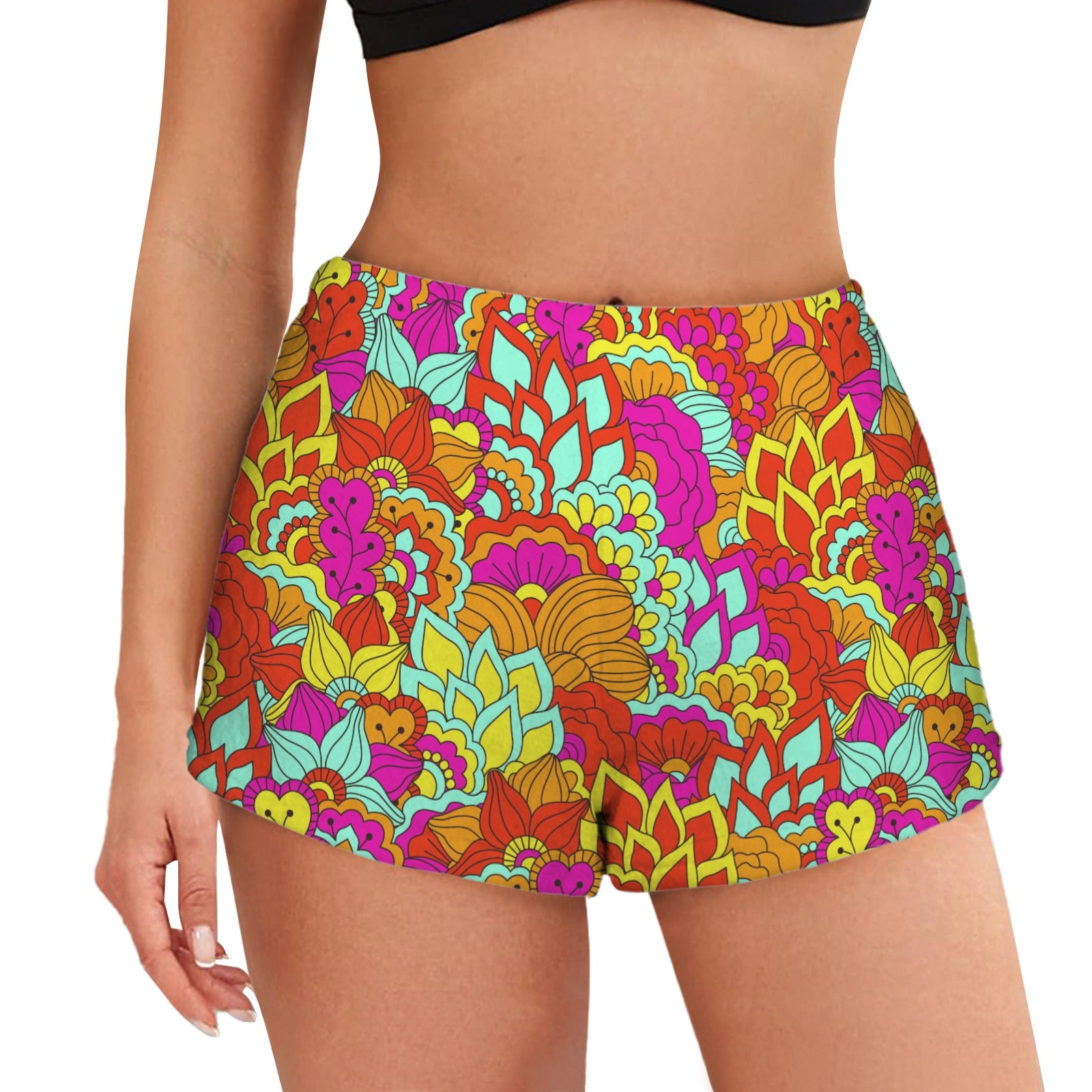 Inela colorful, retro-inspired pajama shorts with a psychedelic floral pattern. These Flower Power shorts are made of soft flannel fabric and have a relaxed fit. Blissfully Brand 