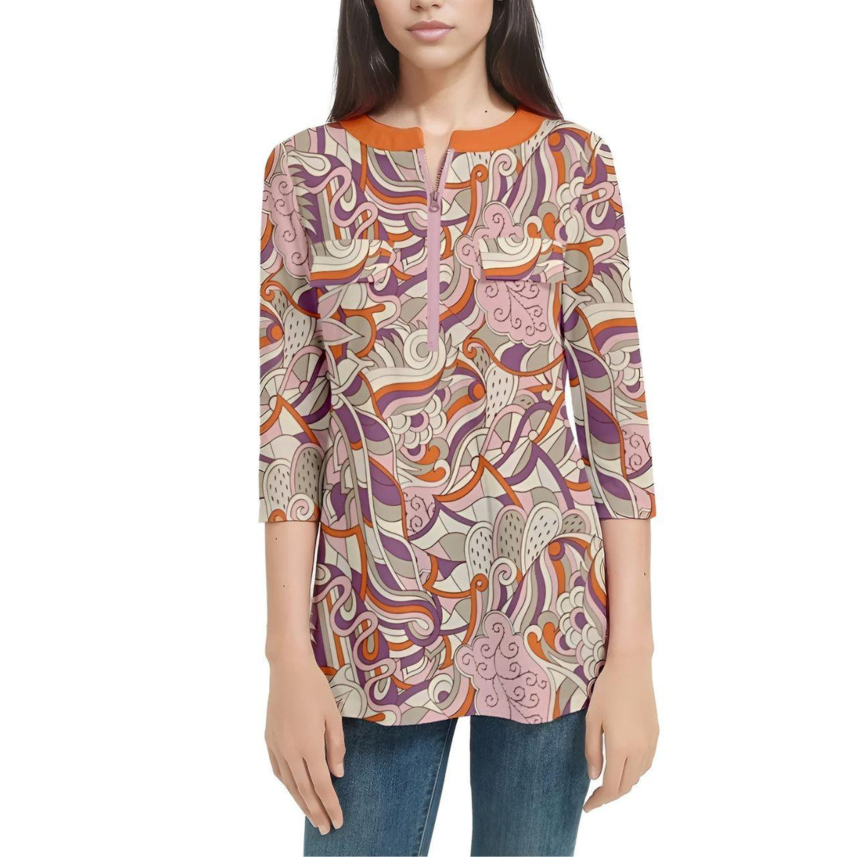 colorful retro-inspired tunic top with psychedelic swirl pattern in shades of orange, purple, and beige. The top has 3/4 sleeves and a flattering fit.