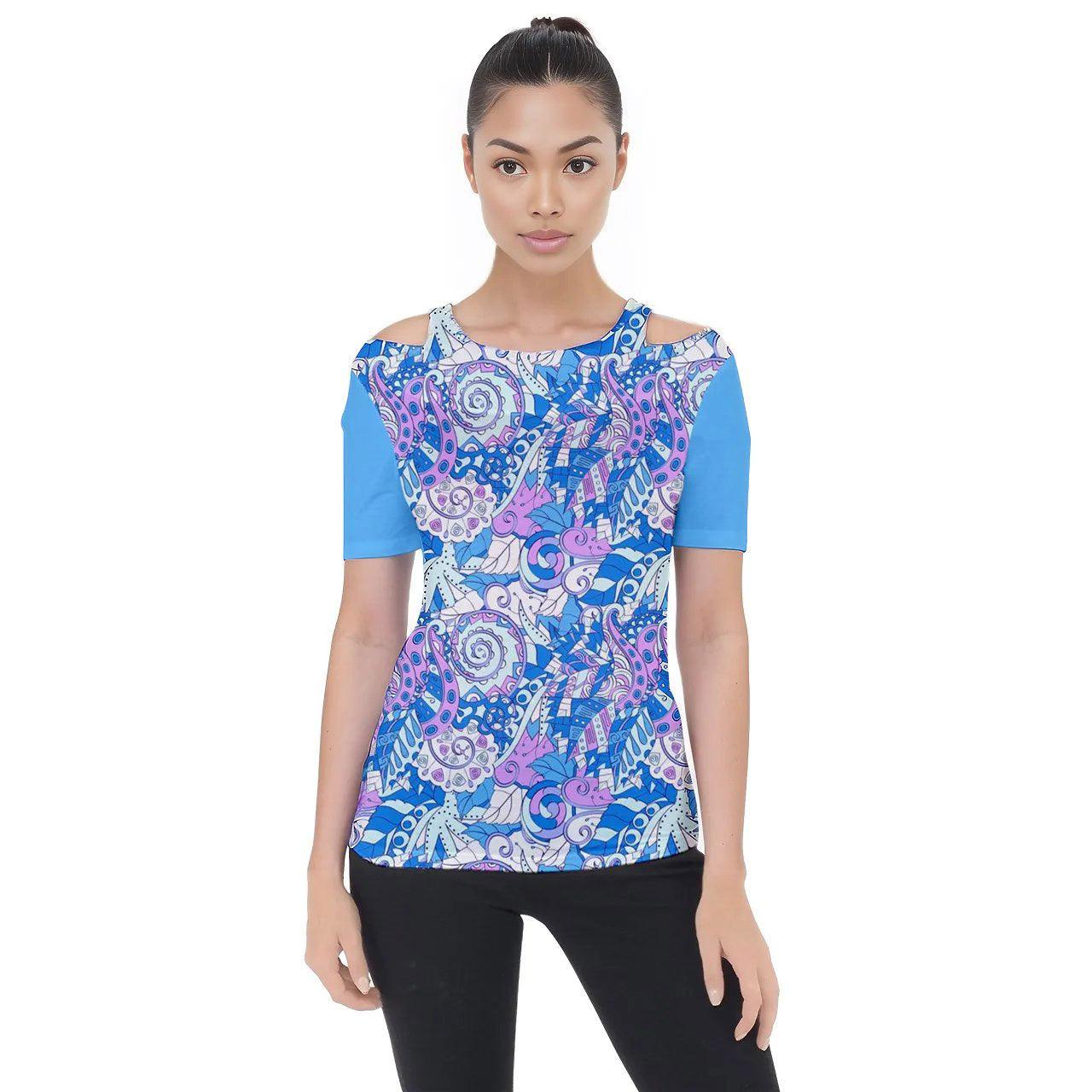 Women's blue and purple abstract print cold shoulder top. This top is perfect for a casual day out or a night out. It is comfortable and stylish. The top has a cold shoulder design that will keep you cool and stylish. The abstract print is eye-catching and will turn heads.