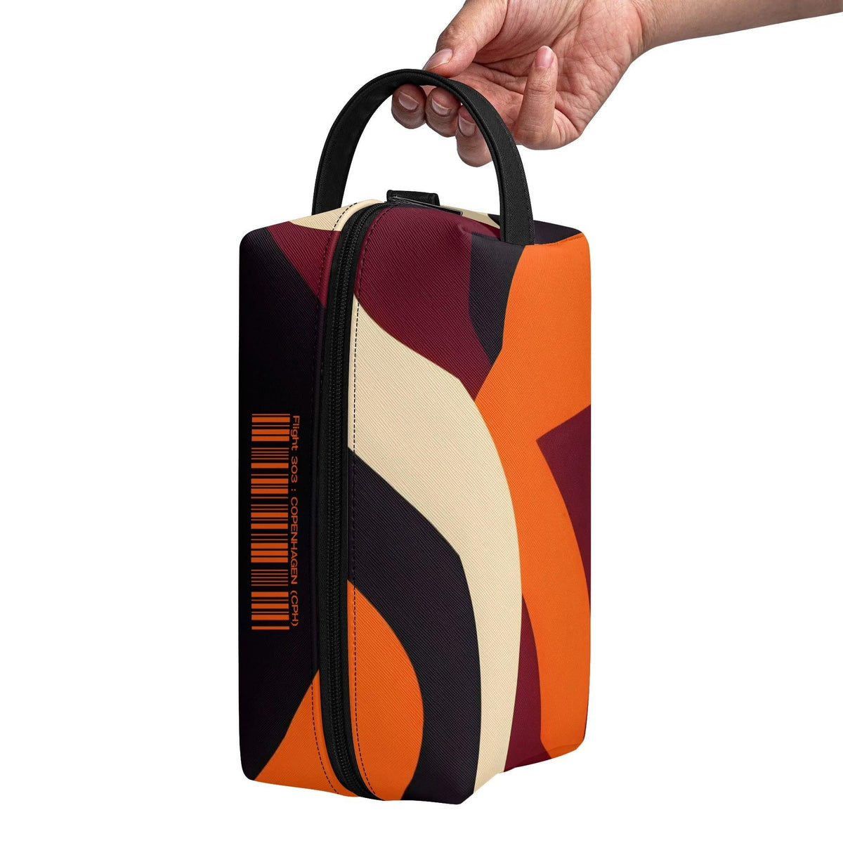 Vibrant retro-inspired travel toiletry bag with bold geometric design in orange, burgundy, cream and black. Sleek rectangular shape with convenient top handle. Stylish and practical for organizing your essentials on the go