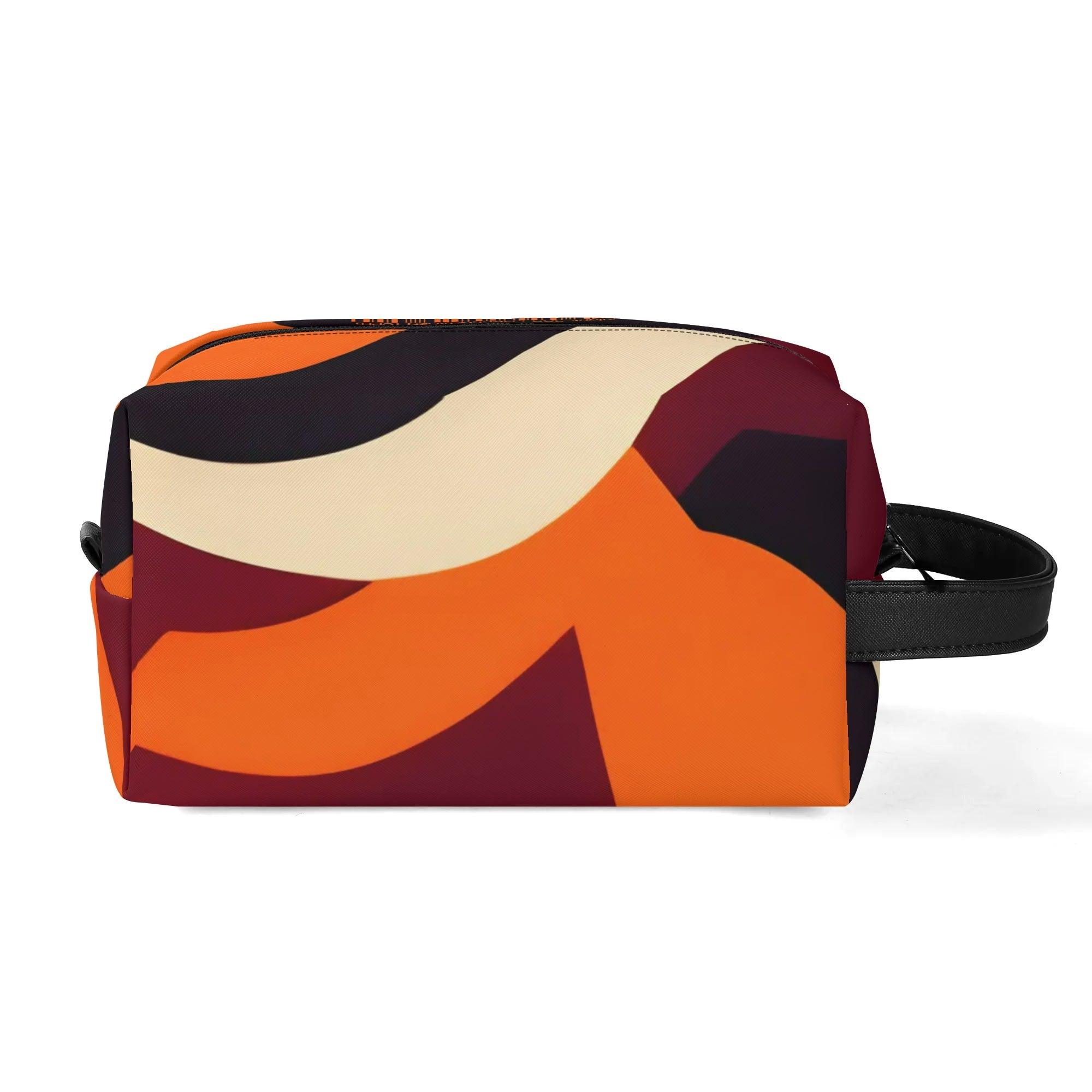 Vibrant retro-inspired travel toiletry bag with bold geometric design in orange, burgundy, cream and black. Sleek rectangular shape with convenient top handle. Stylish and practical for organizing your essentials on the go