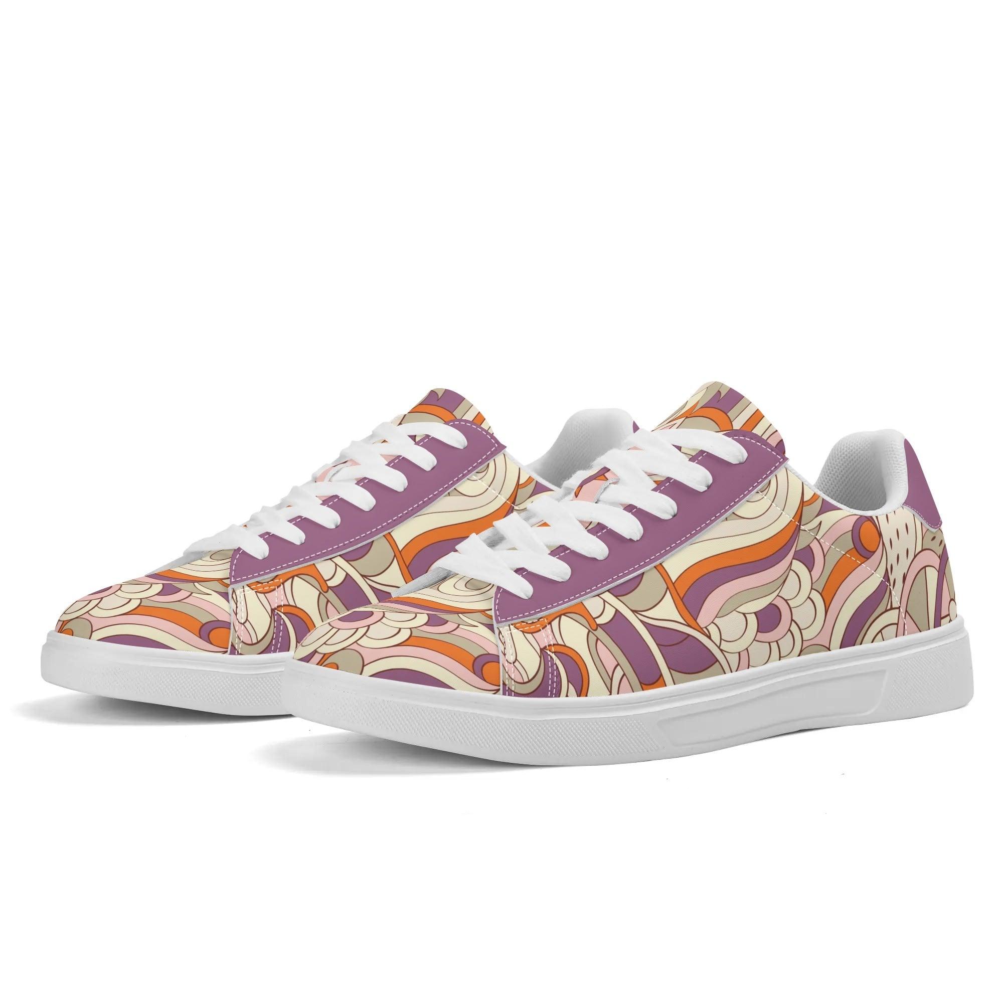 Colorful retro-inspired women's sneakers with abstract swirl pattern in purple, orange, and beige tones. Low-top casual shoes with white laces and soles, featuring a unique 70s-style psychedelic print design perfect for fashion-forward streetwear