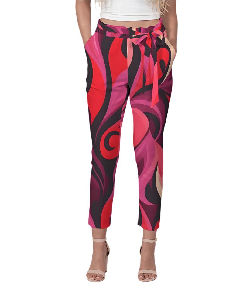 Women's high-waisted trousers with vibrant red and pink abstract print, tie-belt, and ankle-length cut. Prague Retro Chic Airline Series - Blissfully Brand