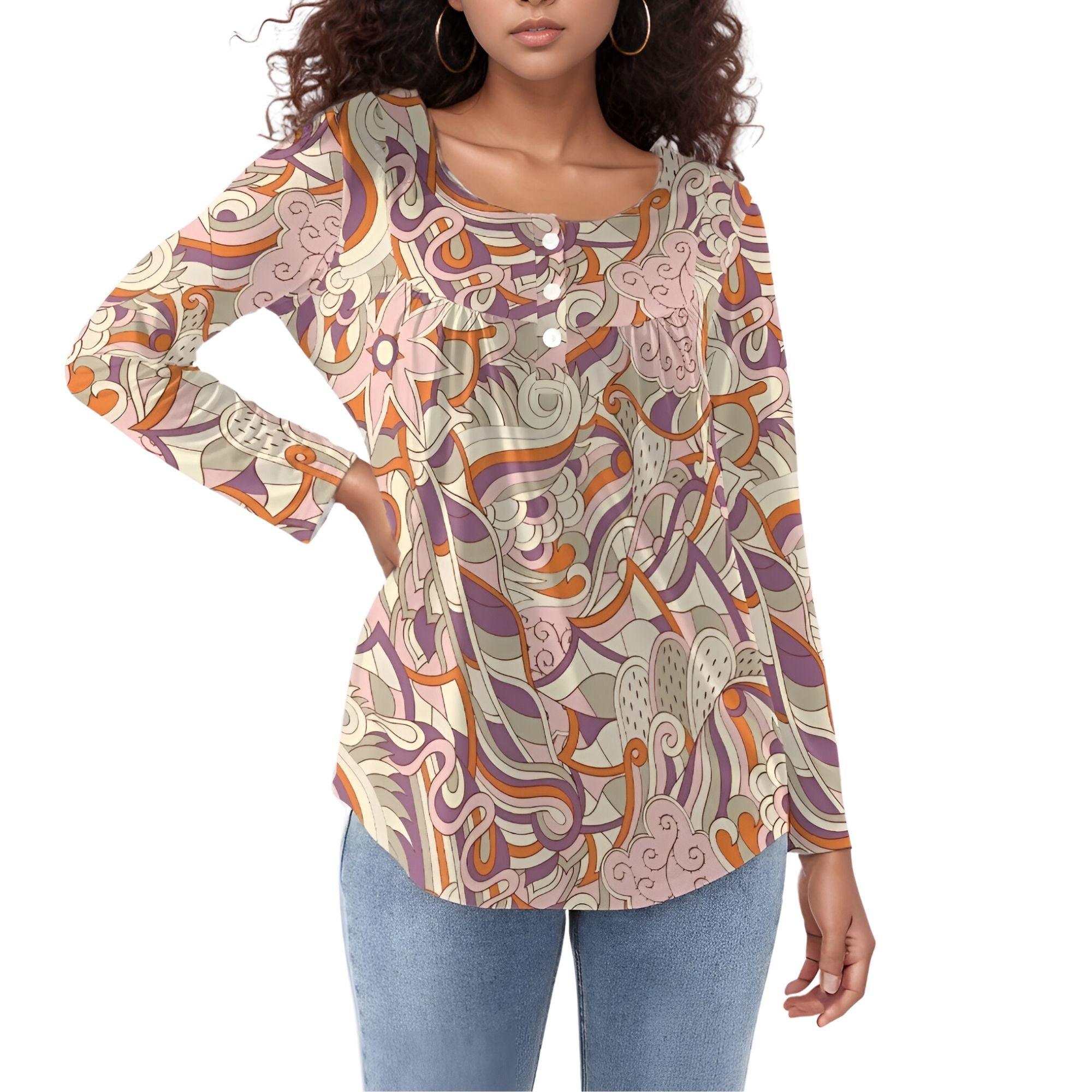 Women's psychedelic pattern long sleeve top with a single button detail, a scoop neck, and a flowy fit.