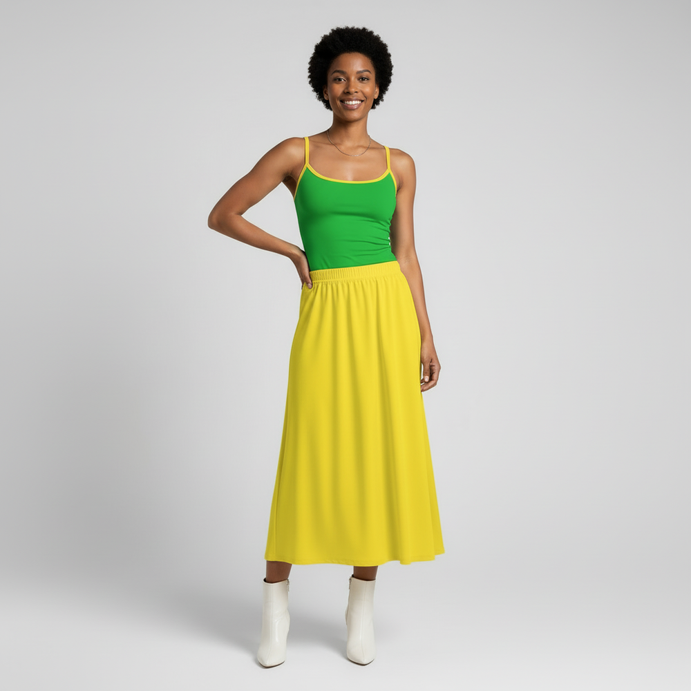 Full length view of canary yellow midi skirt with elastic waistband and gentle flare paired with green spaghetti strap top - Blissfully Brand Lemon High Waisted Midi Skirt