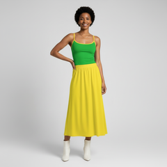 Full length view of canary yellow midi skirt with elastic waistband and gentle flare paired with green spaghetti strap top - Blissfully Brand Lemon High Waisted Midi Skirt