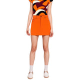 Women's vibrant orange stretch denim mini skirt featuring a high waist and two front pockets, paired stylishly with a bold, geometric patterned top