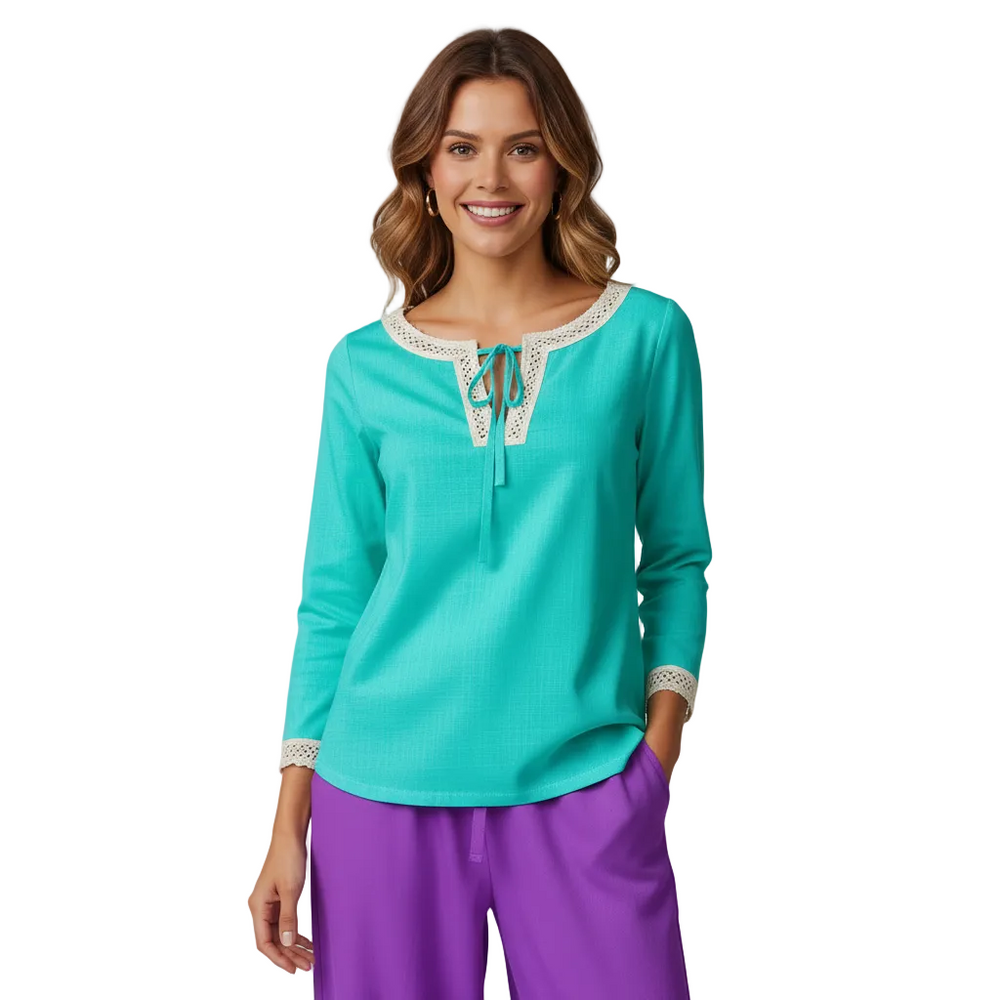 Vibrant cyan split-neck long sleeve blouse with cream lace trim and tie neckline, paired with violet wide-leg pants — Cyan Lace Trim Blouse from Blissfully Brand Core Essentials Series
