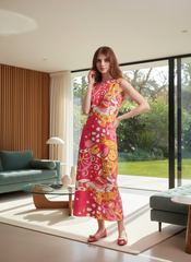 Vibrant and bold Decora maxi dress by Blissfully Brand in retro pink and yellow abstract print - perfect for making a chic statement with bold and vibrant colors with a vintage vibe.