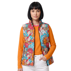 Inia Print Zip-Up Puffer Vest in turquoise and coral floral pattern, styled with orange long sleeve tee, plus size available - Blissfully Brand