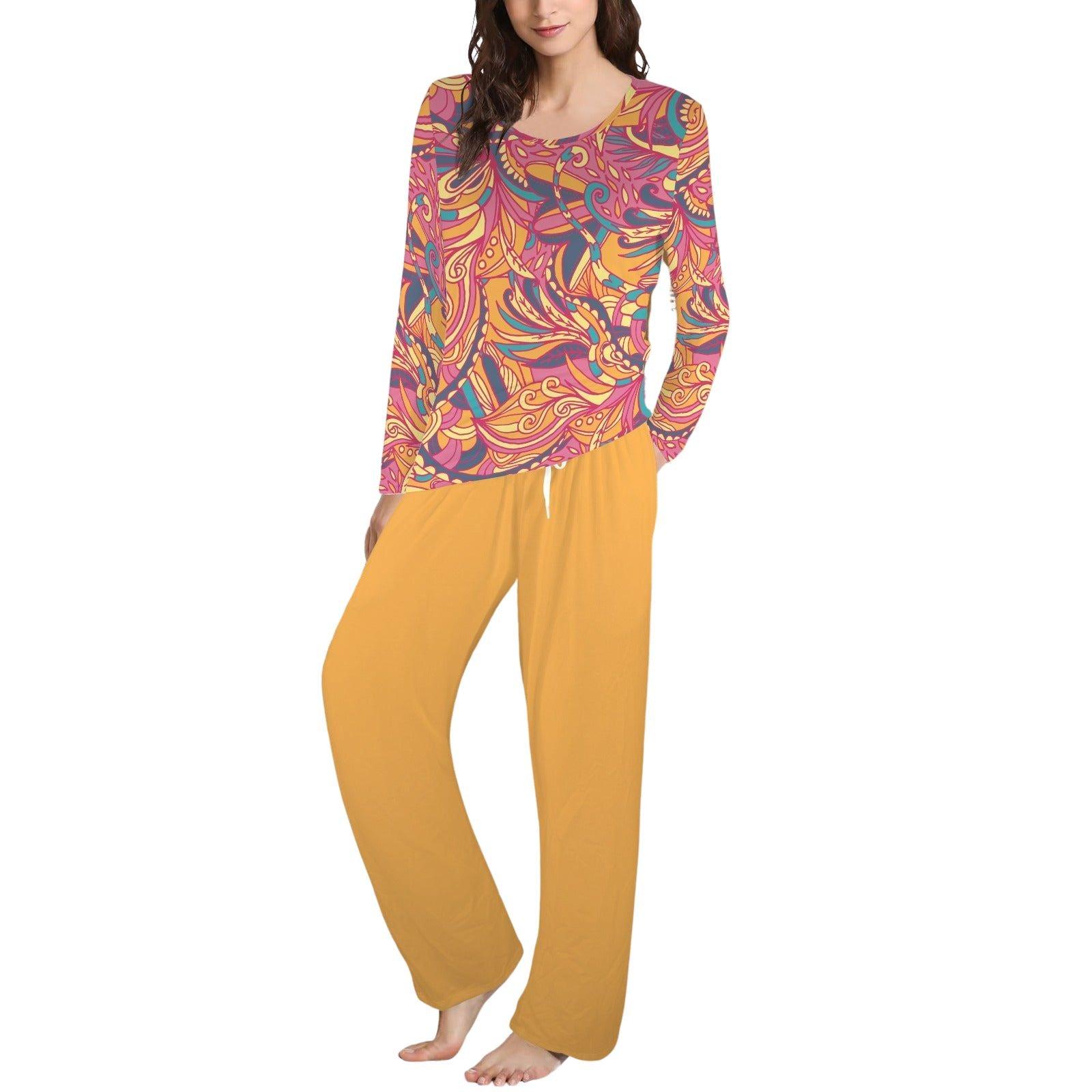 tylish women's 2-piece pajama set featuring long-sleeved psychedelic print top and mustard yellow wide-leg pants, comfortable loungewear, colorful sleepwear