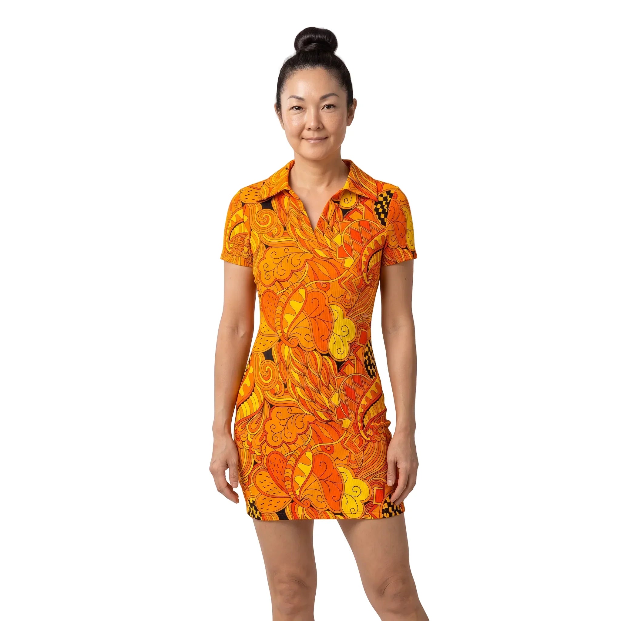 Woman wearing the Mandra Print Ribbed Polo Bodycon Mini Dress, with a retro orange and yellow paisley floral print, polo collar, and short sleeves - Blissfully Brand