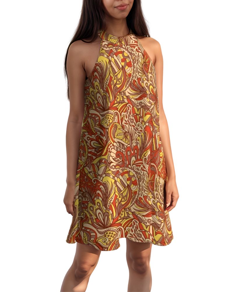 sleeveless dress with a vibrant psychedelic pattern in shades of yellow, orange, and brown. The dress has a halter neckline and an A-line silhouette.  Blissfully Brand