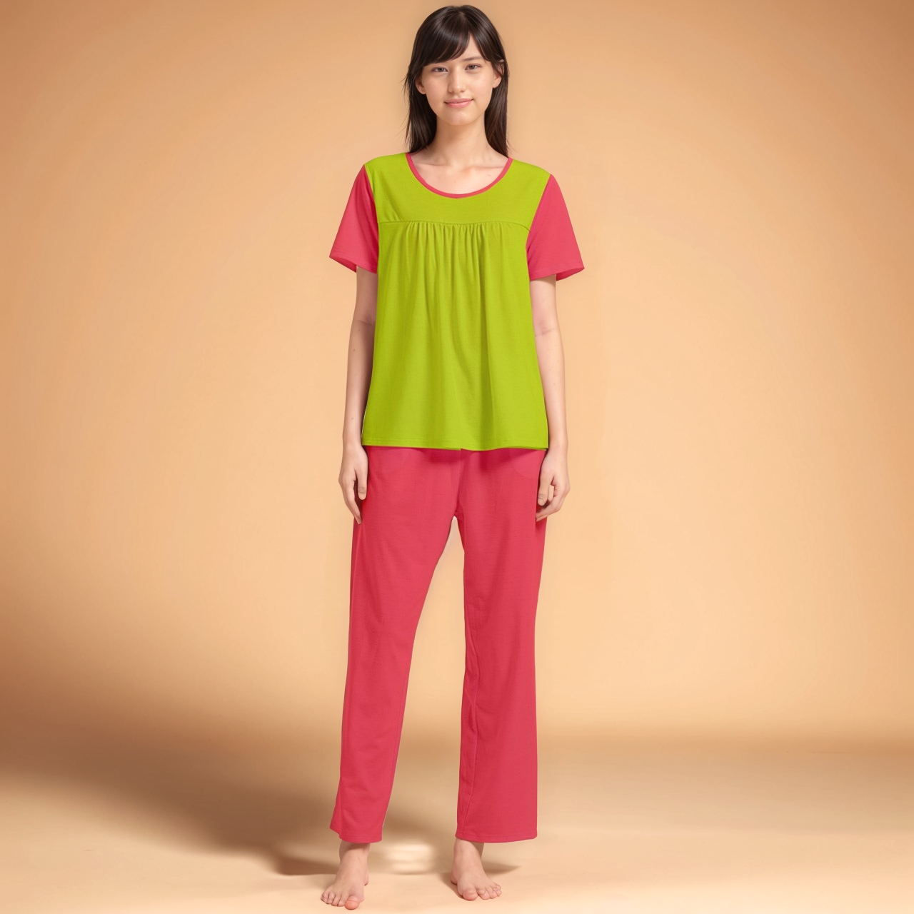 Vibrant lime green and coral red pink Midori two-piece lounge set. The set features a short-sleeved top with a pleated detail and relaxed-fit pants - contrast - Blissfully Brand