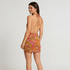 Back view of backless halter dress with adjustable tie strings at neck showing Mina paisley print - Blissfully Brand mini dress