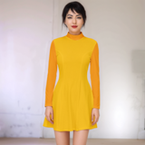 Retro-style mustard yellow velour mock neck dress with orange long sleeves and A-line silhouette, featuring princess seams and mini length - Airline Series by Blissfully Brand