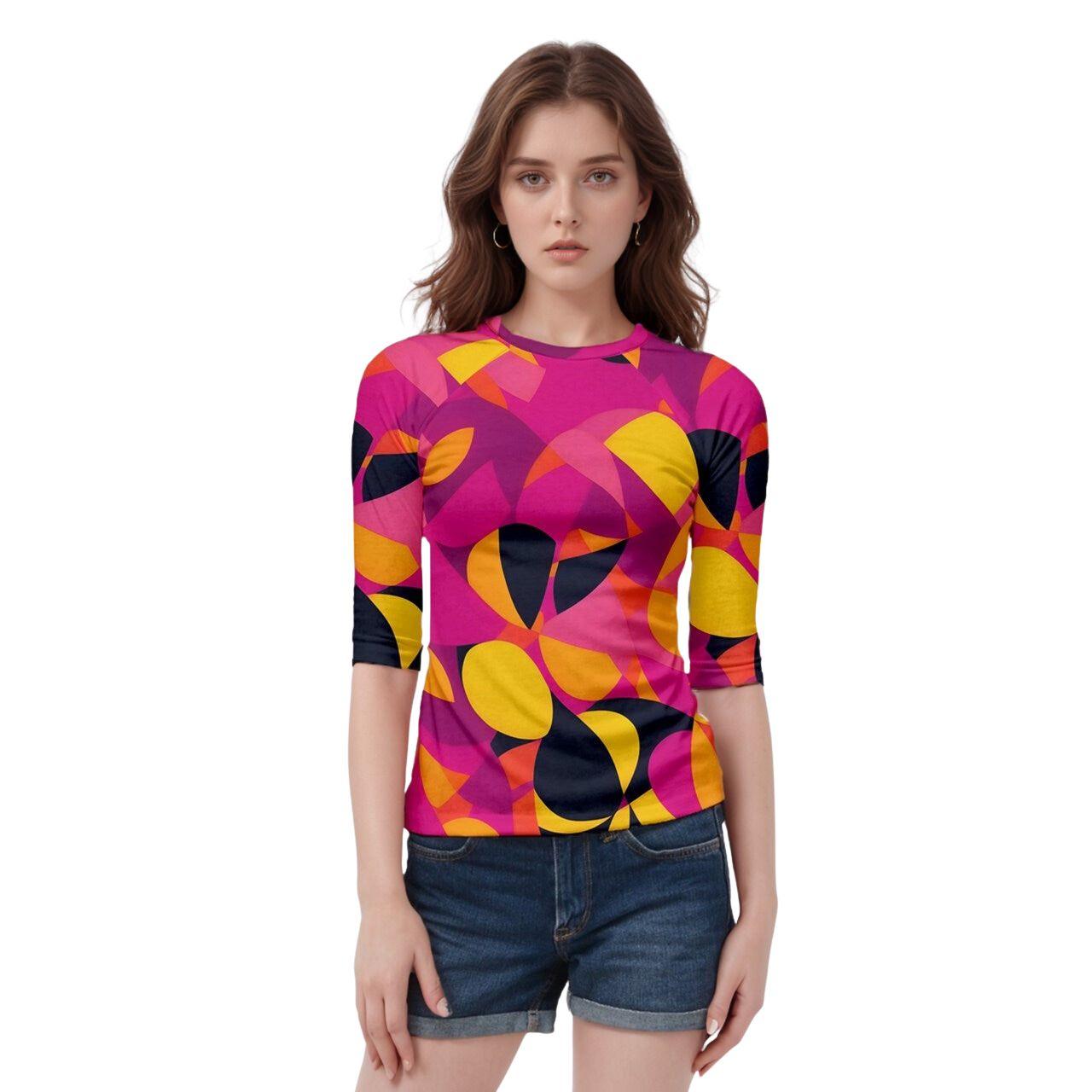 Women's 3/4 Sleeve Raglan Tee with Bold Geometric Print in Pink, Yellow, and Black. This comfortable and stylish tee features a vibrant and eye-catching design