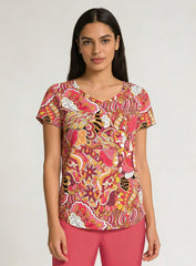 Nami print V-neck tee in warm red, peach, pink and olive paisley maximalist print — Blissfully Brand Profonde Collection, handmade Montreal, relaxed fit with rounded hem