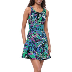 Nela skater dress with a psychedelic, retro-inspired print. The dress features swirling patterns in shades of teal, green, purple, and black - Mini - Blissfully Brand Made in England