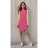 Palai Series Spacer Dress, a vibrant pink and yellow color block knee length dress with long sleeves, contrast colors crew neck side slit. Bold by Blissfully Brand