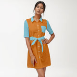 Fashion-forward color-block shirt dress in burnished orange and turquoise with fabric belt and front pocket Retro Bold